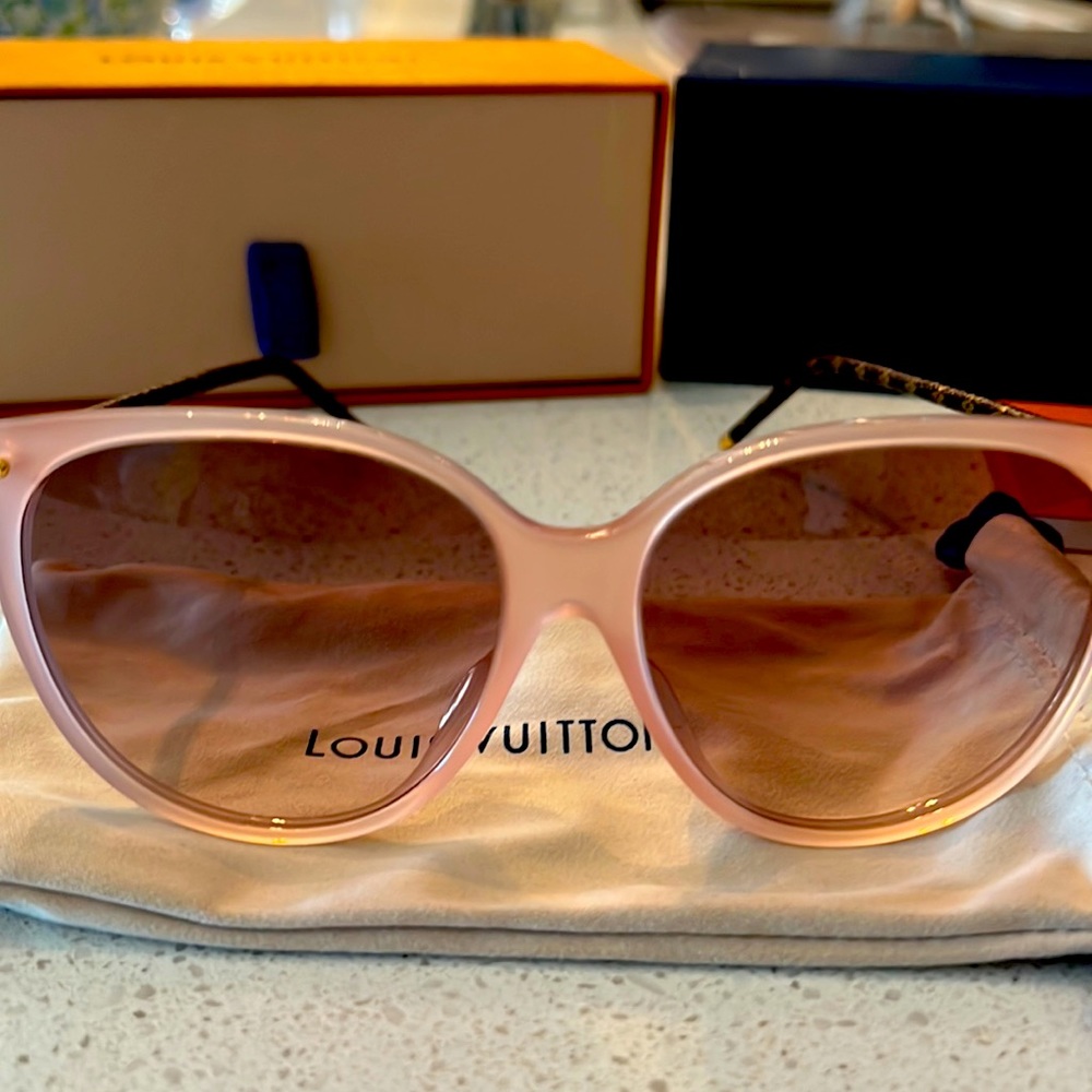 Authentic Louis Vuitton sunglasses (New) comes with dust cover and cases.
